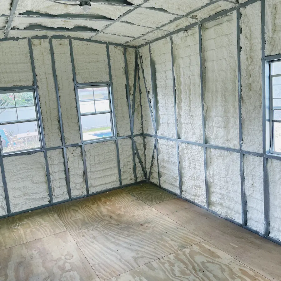 Closed-cell spray foam insulation applied to wall cavities in a residential project in Ridley